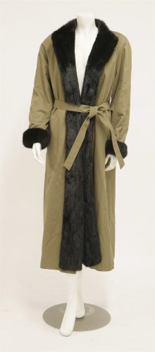 Lot 1415 - An Aquascutum long-haired black Russian mink lined mackintosh coat