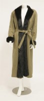 Lot 1415 - An Aquascutum long-haired black Russian mink lined mackintosh coat