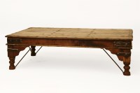 Lot 695 - An Indian hardwood and iron bound coffee table