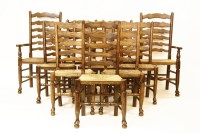 Lot 710 - A matched set of ten Lancashire ladder back chairs