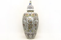 Lot 423 - A large French faience temple jar and cover