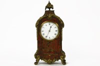Lot 204 - A tortoiseshell and brass inlaid boulle mantle clock