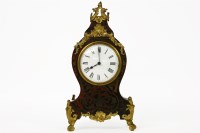 Lot 181 - A tortoiseshell and brass inlaid boulle mantle clock