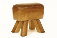 Lot 528 - A leather stool in the form of a pommel horse  62cm L x 28cm W x 55cm H