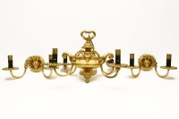 Lot 338 - A vintage gilt metal electrolier and matching wall lights with Adams style rams heads