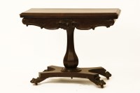 Lot 631 - A Victorian rosewood fold over top card table