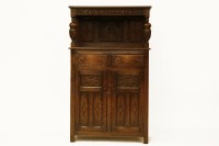 Lot 474 - A 17th century style oak court cupboard