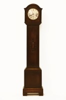 Lot 665 - An oak cased grandmother clock