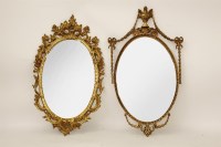 Lot 666 - Two gilt wall mirrors