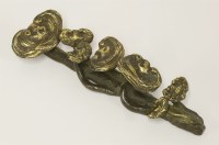 Lot 403 - A Chinese bronze scroll weight