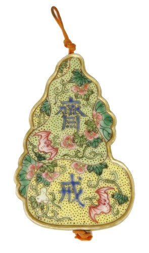 Lot 73 - A Chinese famille rose abstinence plaque