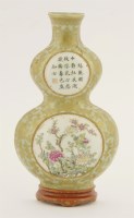 Lot 117 - A famille rose wall pocket vase