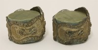 Lot 150 - A pair of Chinese silver hinged bangles