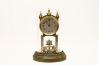 Lot 420 - An early 20th century Becker brass anniversary clock