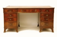 Lot 521 - A mahogany partner's desk