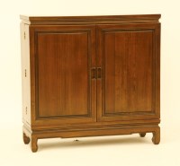 Lot 642 - An oriental hardwood CD storage cupboard