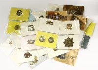 Lot 135D - A large collection of military cap and other badges