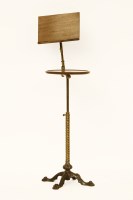 Lot 637 - A Victorian mahogany and brass reading stand