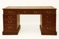 Lot 455 - An Edwardian mahogany pedestal partners desk