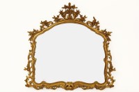 Lot 657 - A large rectangular gilt framed mirror in the roccoco style