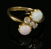 Lot 40 - An 18ct gold Edwardian opal and diamond crossover ring