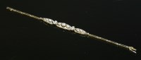 Lot 138 - A French Belle Époque diamond set bracelet