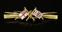 Lot 191 - A two-colour crossed oars and crossed flags tie pin or lapel badge
