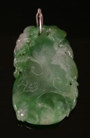Lot 125 - A Chinese carved jade pendant