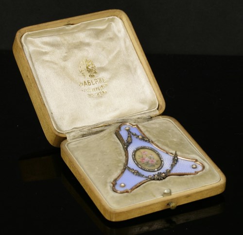 187 - A Fabergé gold and silver photograph frame