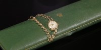 Lot 214 - A ladies' 9ct gold Rolex mechanical bracelet watch