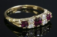 Lot 82 - A late Victorian ruby and diamond carved head ring