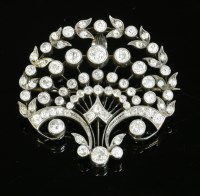 Lot 133 - A Belle Époque diamond set brooch/pendant