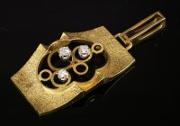 Lot 238 - A gold Modernist diamond set pendant