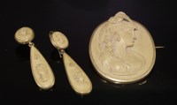Lot 2 - A Victorian lava cameo brooch and earring matched suite
