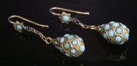 Lot 48 - A pair of cabochon turquoise drop earrings