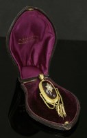Lot 34 - A cased Victorian garnet and diamond swag and tassel pendant