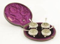 Lot 486 - A Victorian cased set of four silver salts and Edward VII silver spoons