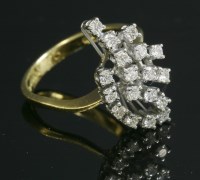 Lot 287 - An 18ct gold diamond set spray cluster ring