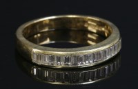 Lot 317 - An 18ct gold diamond set half eternity ring