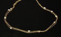 Lot 53 - An Edwardian gold cabochon opal set long chain