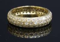 Lot 313 - A gold pavé diamond set 'D' section band ring