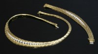 Lot 210 - An 18ct gold diamond set necklace and bracelet suite
