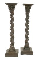 Lot 654A - A pair of oak Solomonic column torchères