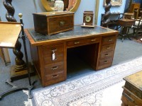 Lot 654 - An early 20th century mahogany twin pedestal desk