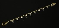 Lot 331 - A gold and silver bead link bracelet