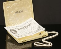 Lot 266 - A single row graduated opera length cultured pearl necklace