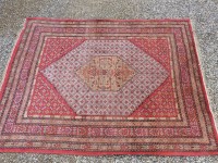 Lot 506 - A large hand knotted carpet