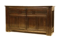 Lot 459 - A 17th century and later oak cupboard