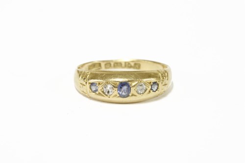 Lot 17 - An 18ct gold five stone graduated sapphire and diamond ring