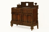 Lot 498A - An unusual Continental carved oak cabinet